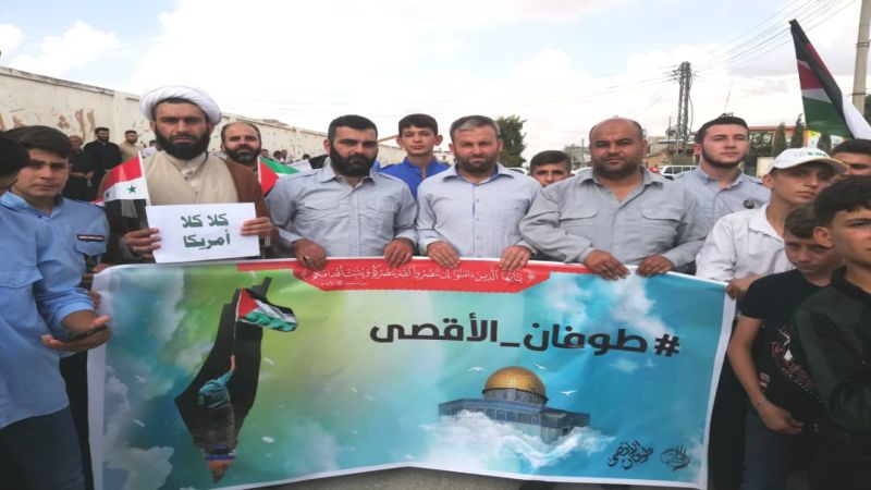 وقفة تضامنية في مدينتي نبل والزهراء تضامناً مع غزة