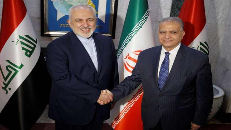 ظريف من بغداد: الرئيس الإيراني يزور العراق في آذار المقبل