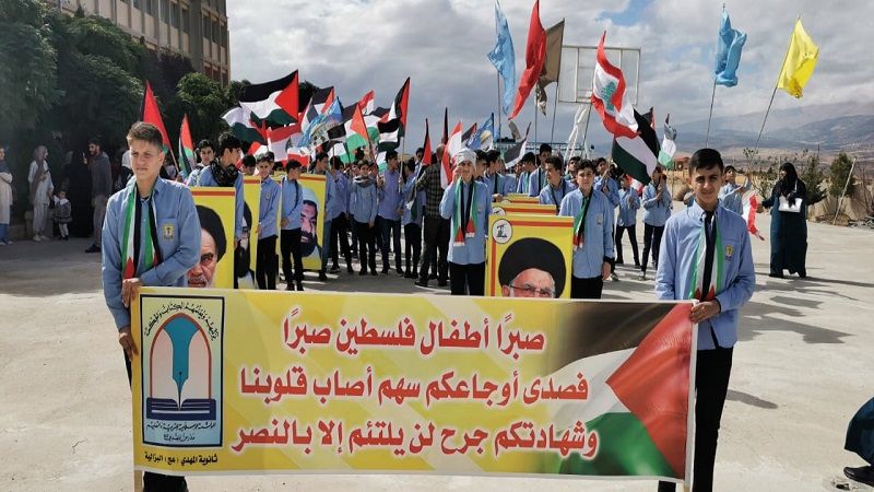 بالصور.. مسيرة تضامنية مع غزة في ثانوية المهدي (عج) - البزالية