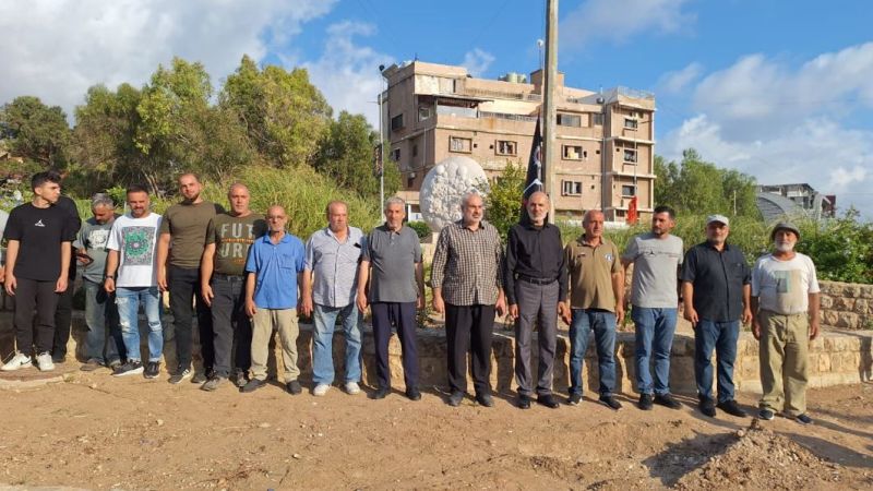 بالصور| رفع الراية الحسينية عند دوار الجندولين وفي ملعب العهد في الأوزاعي